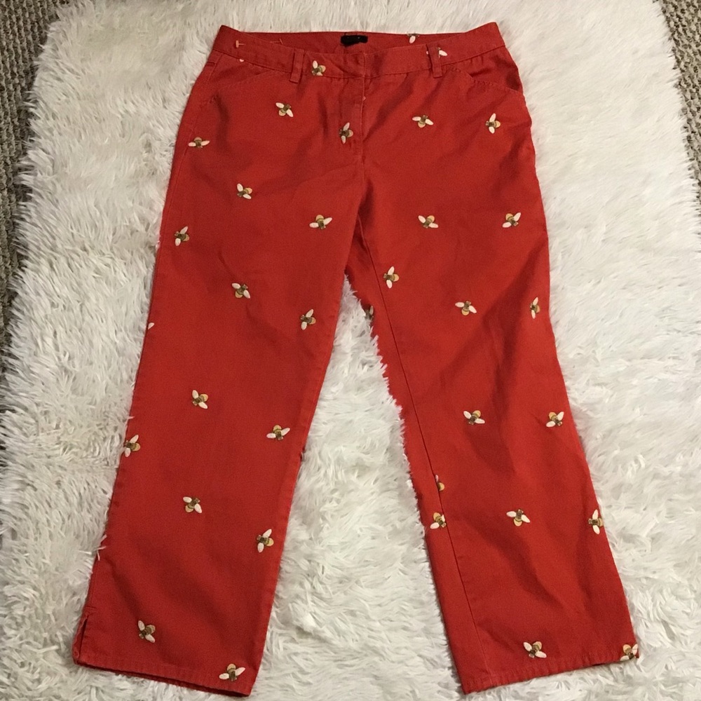 Woman’s j crew capris orange with bumblebee.
